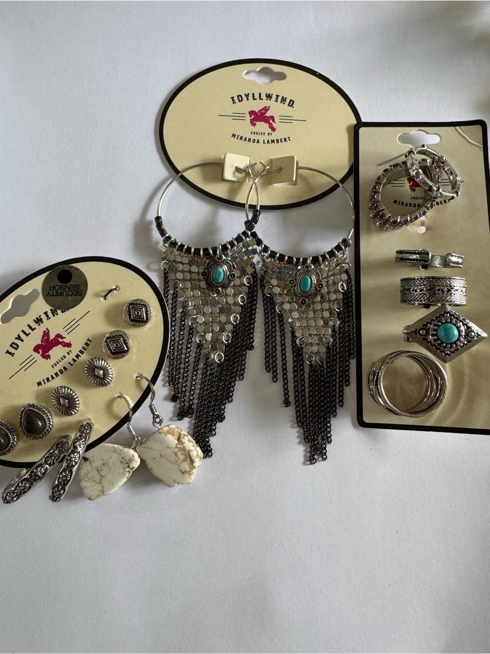 Idyllwind Silver-Tone Hoop Earrings with Turquoise Cabochons and Black Fringe